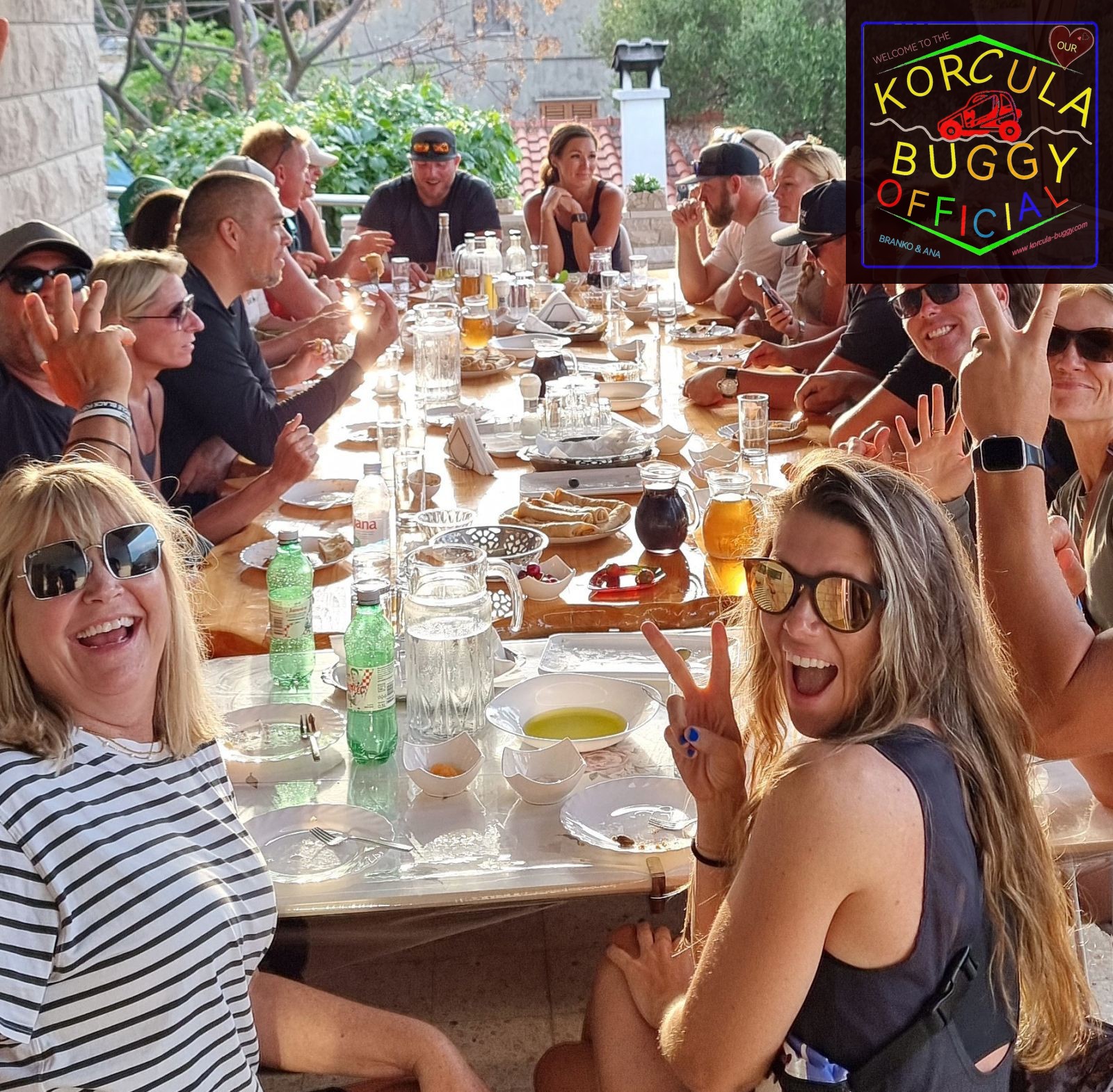 Dining table with fresh local food and wine on the private family terrace at the end of Korcula Buggy Official safari tour
