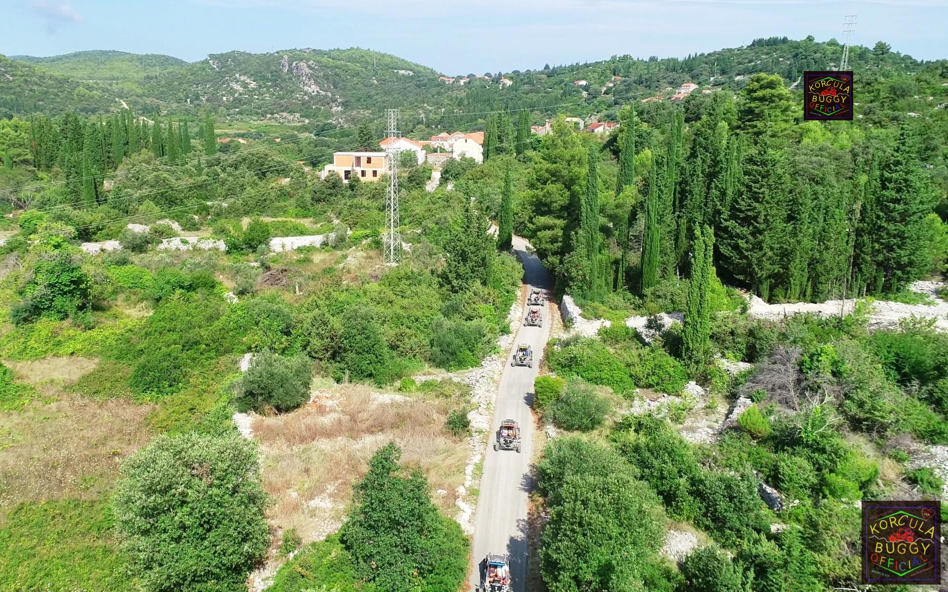 Buggy safari vehicles driving trough the traditional stone houses and streets of Zrnovo and Postrana villages and Korcula